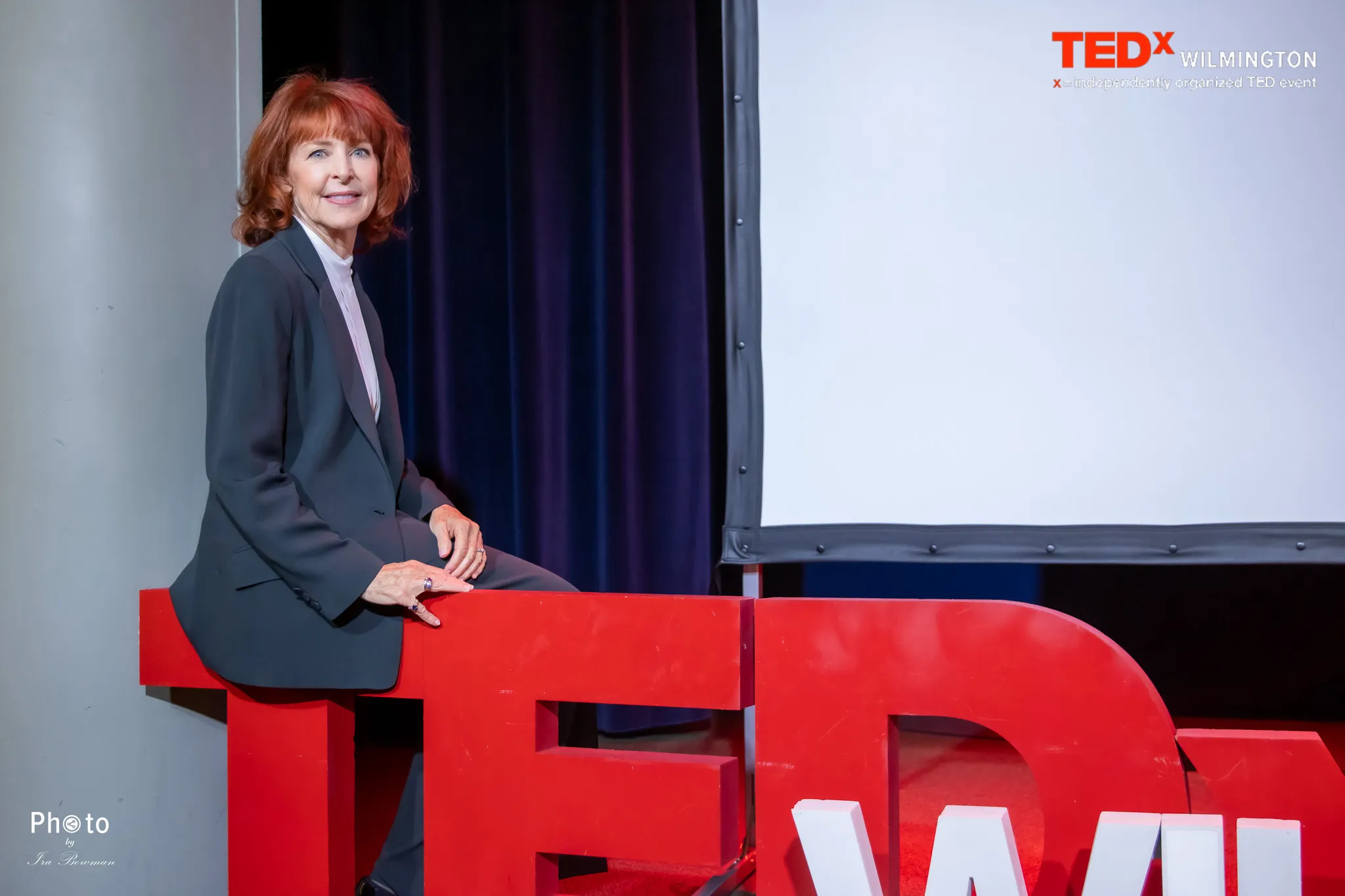 Sue Ryan poses at TEDx Talk